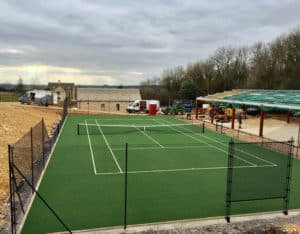 En Tout Cas tennis court fencing. Eastate fencing on a new court.